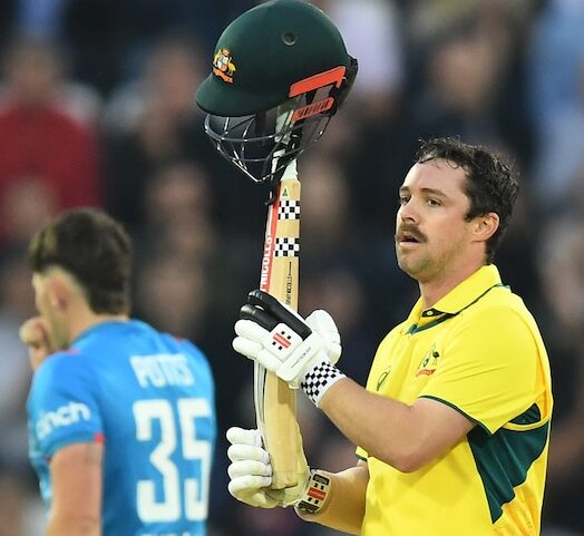 Travis Head smashing a six during an ODI against England